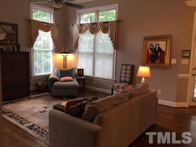 9101 Carrington Ridge Drive Raleigh, NC 27615 - Photo 4 of 14 a living room with furniture and a large window