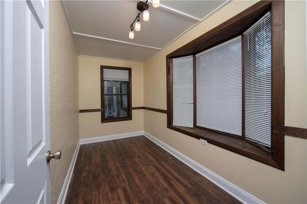101 Shadyhill Road Pittsburgh, PA 15205 - Photo 11 of 25 ADDITIONAL ROOM featuring its wall of windows and great lighting. This room could be used as a morning room, home office or day nursery. Its easy access to the kitchen adds to the functionality of this space.