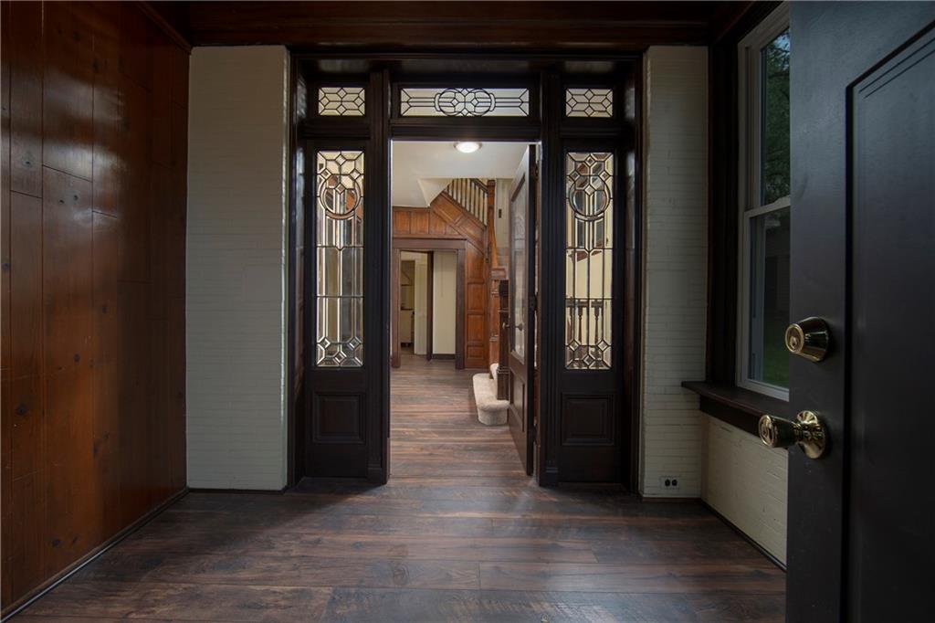 101 Shadyhill Road Pittsburgh, PA 15205 - Photo 3 of 25 ENTRYWAY-Features high grade laminated floors, neutral tones, polished dark wood and leaded French doors.