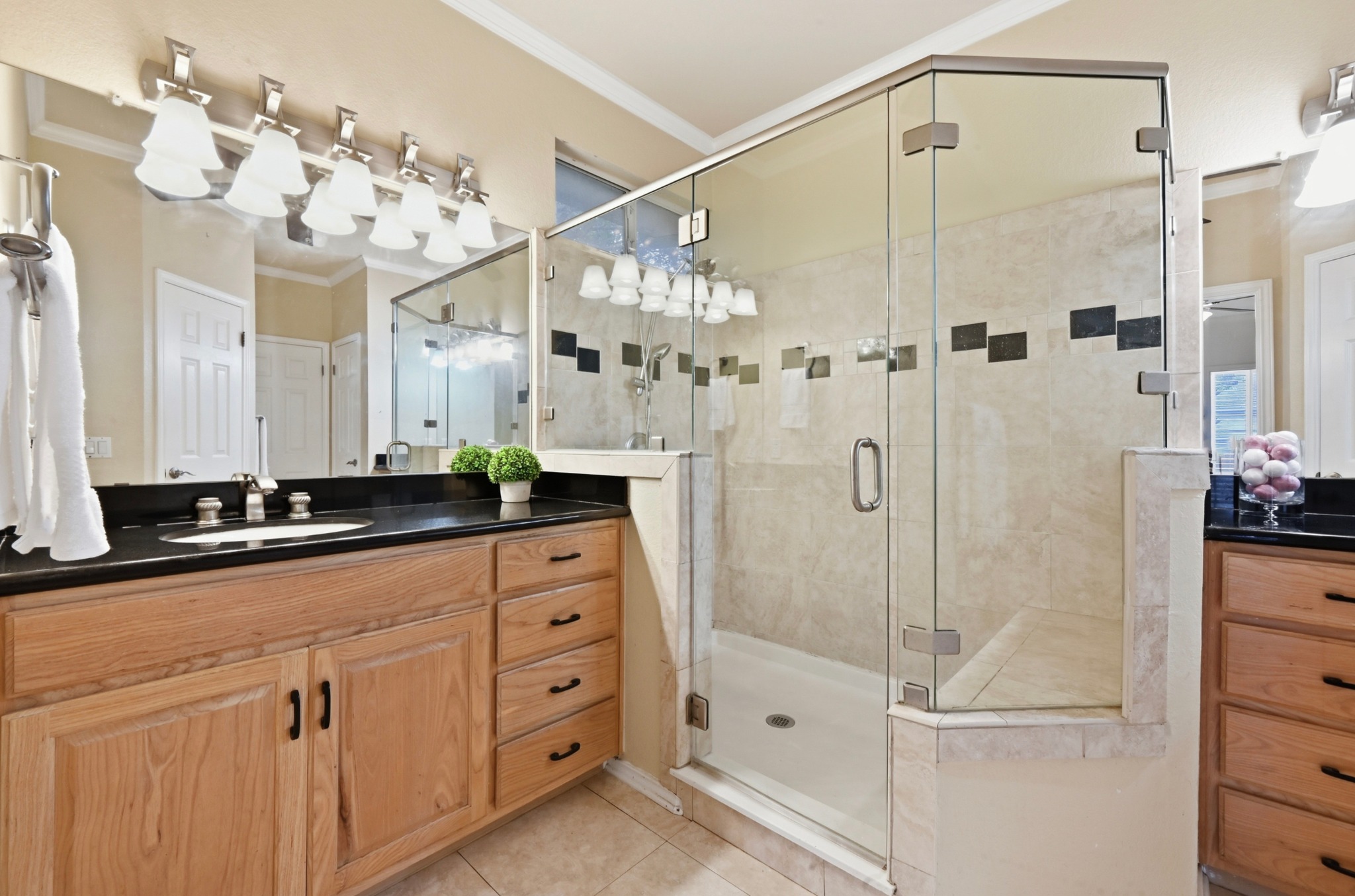 5313 Moon Shadow Drive Austin, TX 78735 - Photo 22 of 30 Glass-enclosed shower with tiled surround and decorative accents