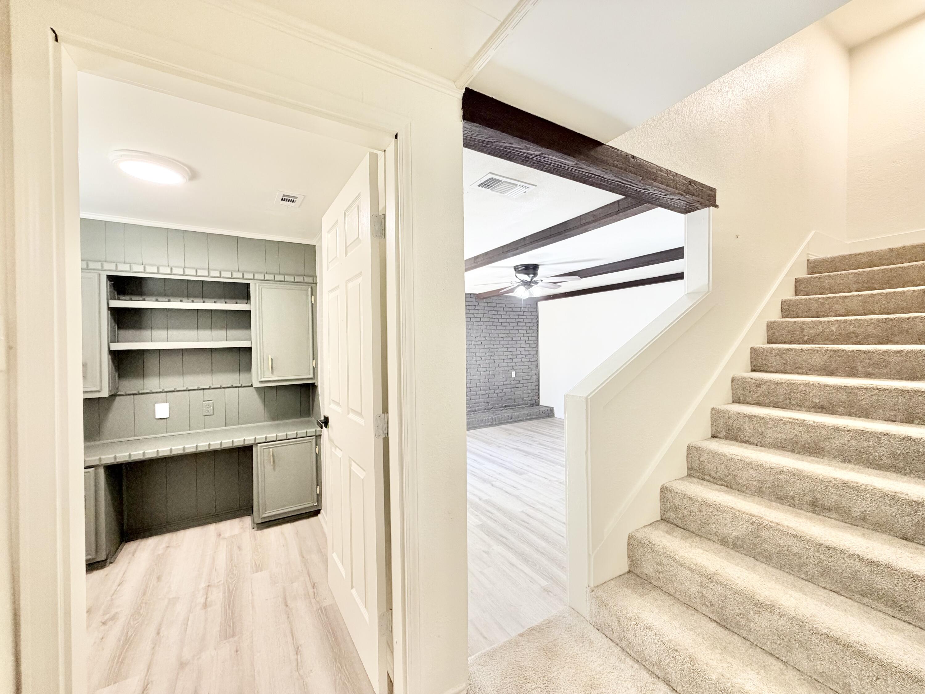 3407 30th Street Lubbock, TX 79410 - Photo 15 of 26 a view of entryway and hall with wooden floor