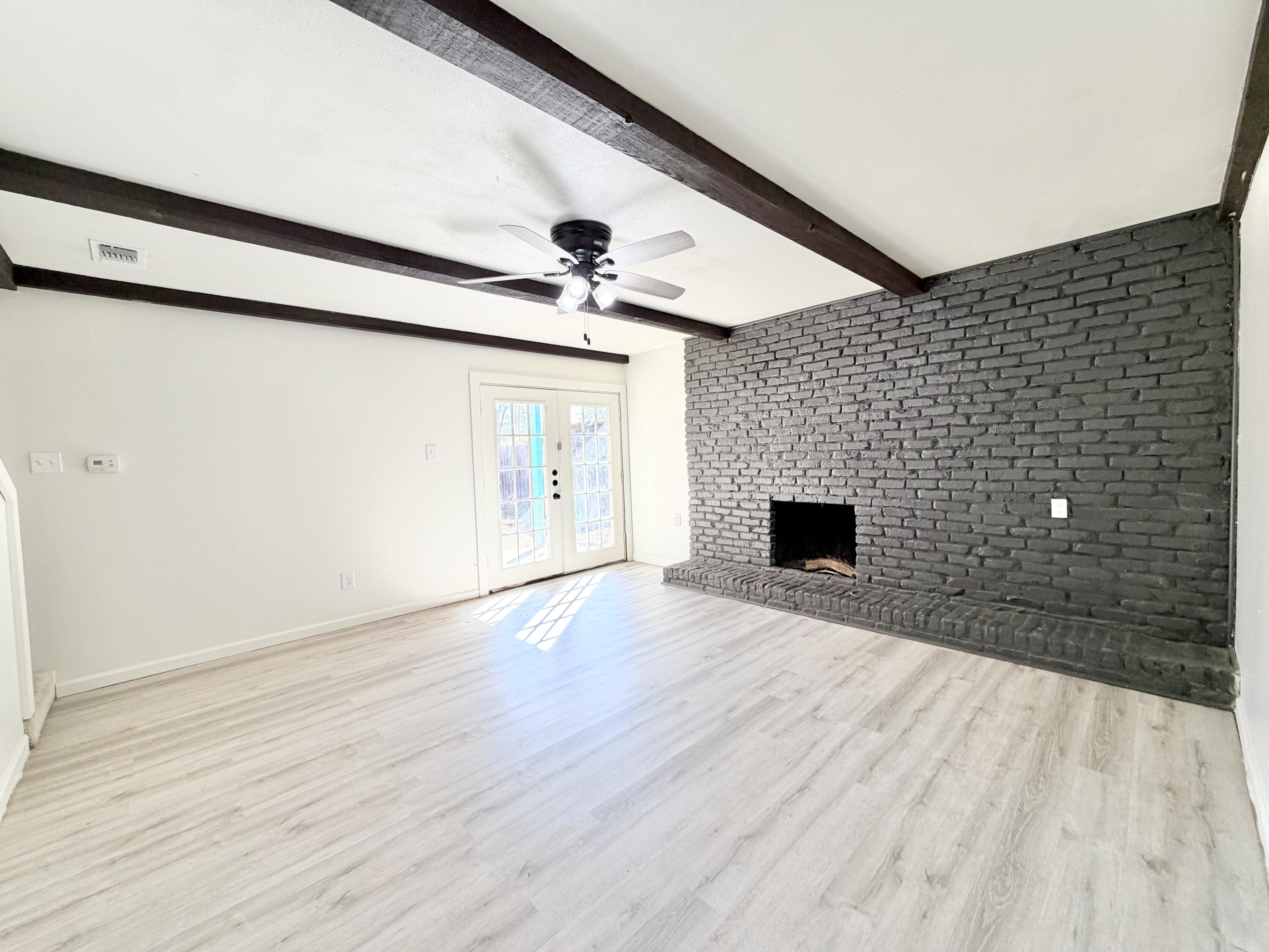 3407 30th Street Lubbock, TX 79410 - Photo 17 of 26 a view of empty room with wooden floor