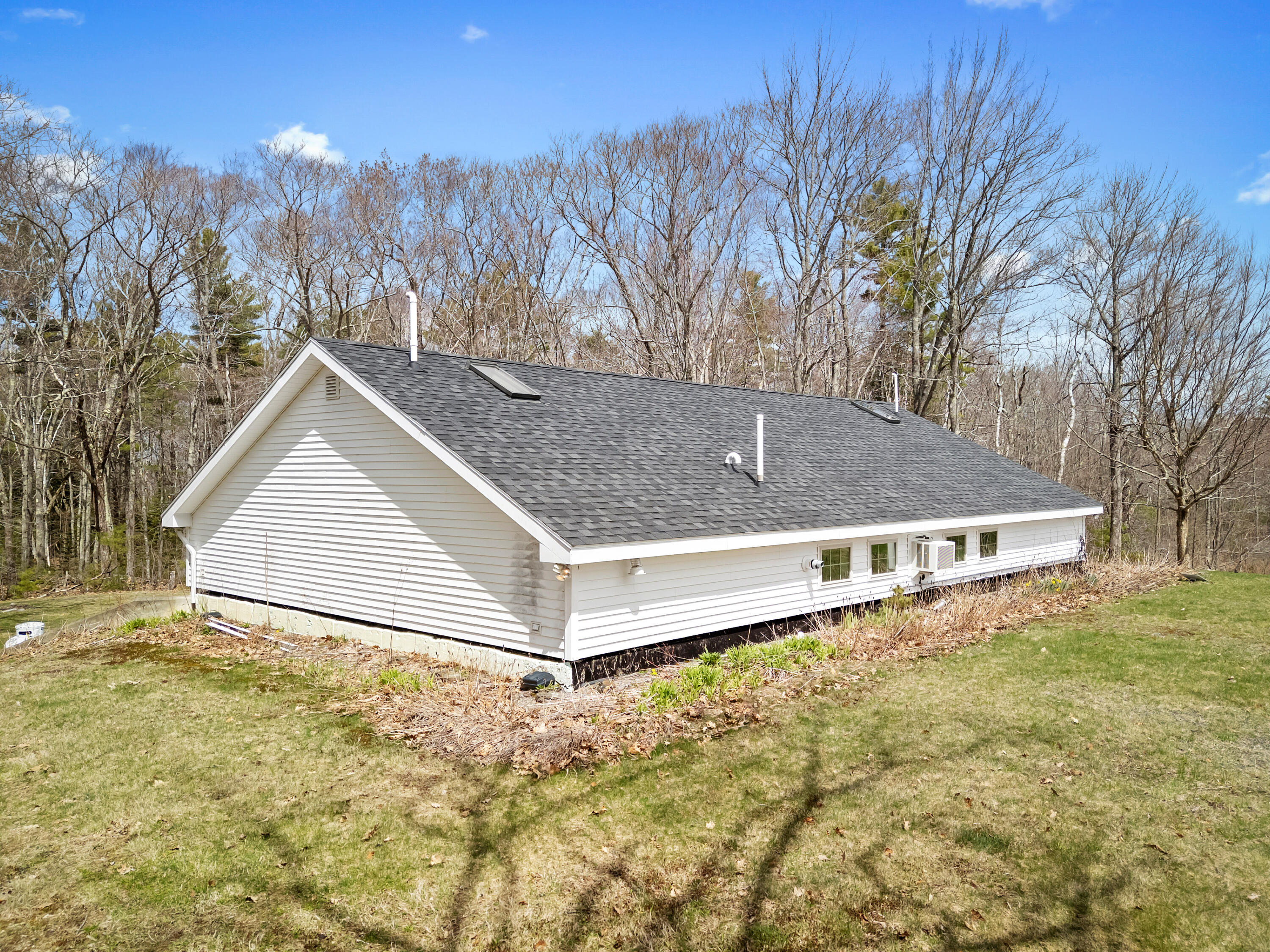 65 B Augusta Road Belmont, ME 04952 - Photo 35 of 40 Energy Efficient Berm