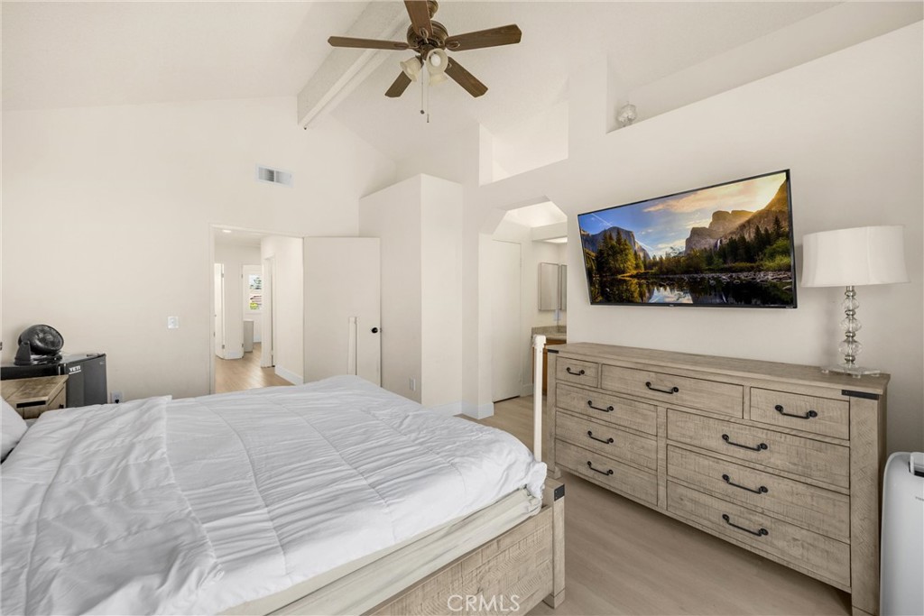 7077 Campbell Place Rancho Cucamonga, CA 91701 - Photo 34 of 74 a bedroom with a bed and a flat screen tv