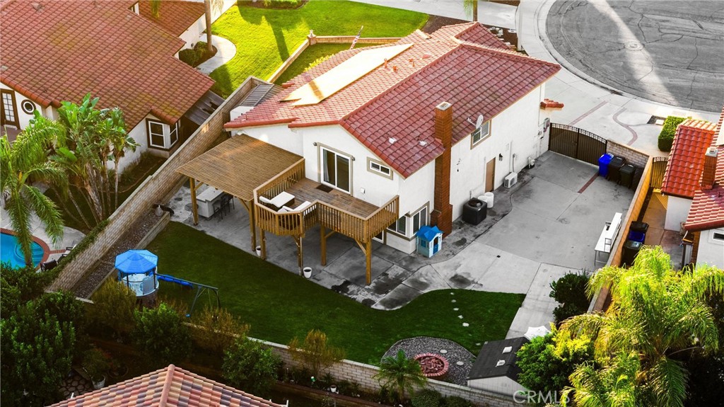 7077 Campbell Place Rancho Cucamonga, CA 91701 - Photo 64 of 74 an aerial view of a house with a garden
