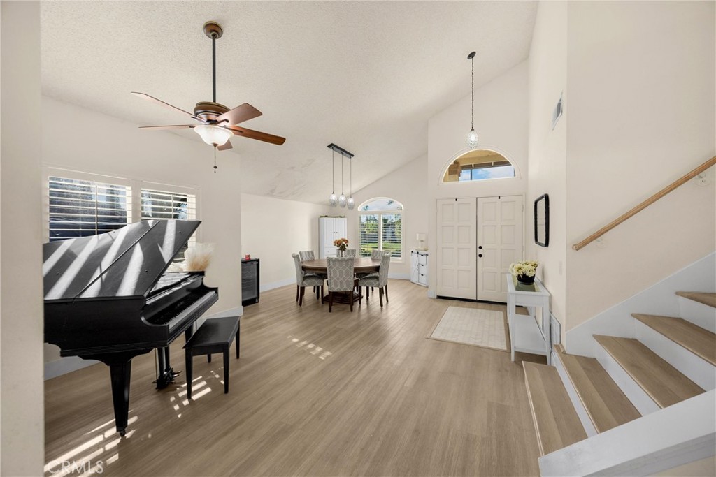 7077 Campbell Place Rancho Cucamonga, CA 91701 - Photo 8 of 74 a view of a livingroom with furniture and a piano
