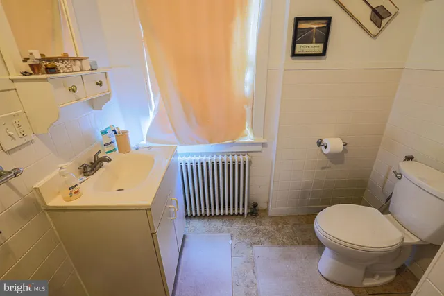 a kitchen with sink cabinets and appliances
