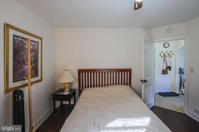 a picture of a bathroom with a shower