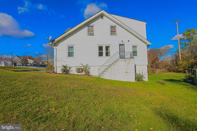 a room with furniture and a large window