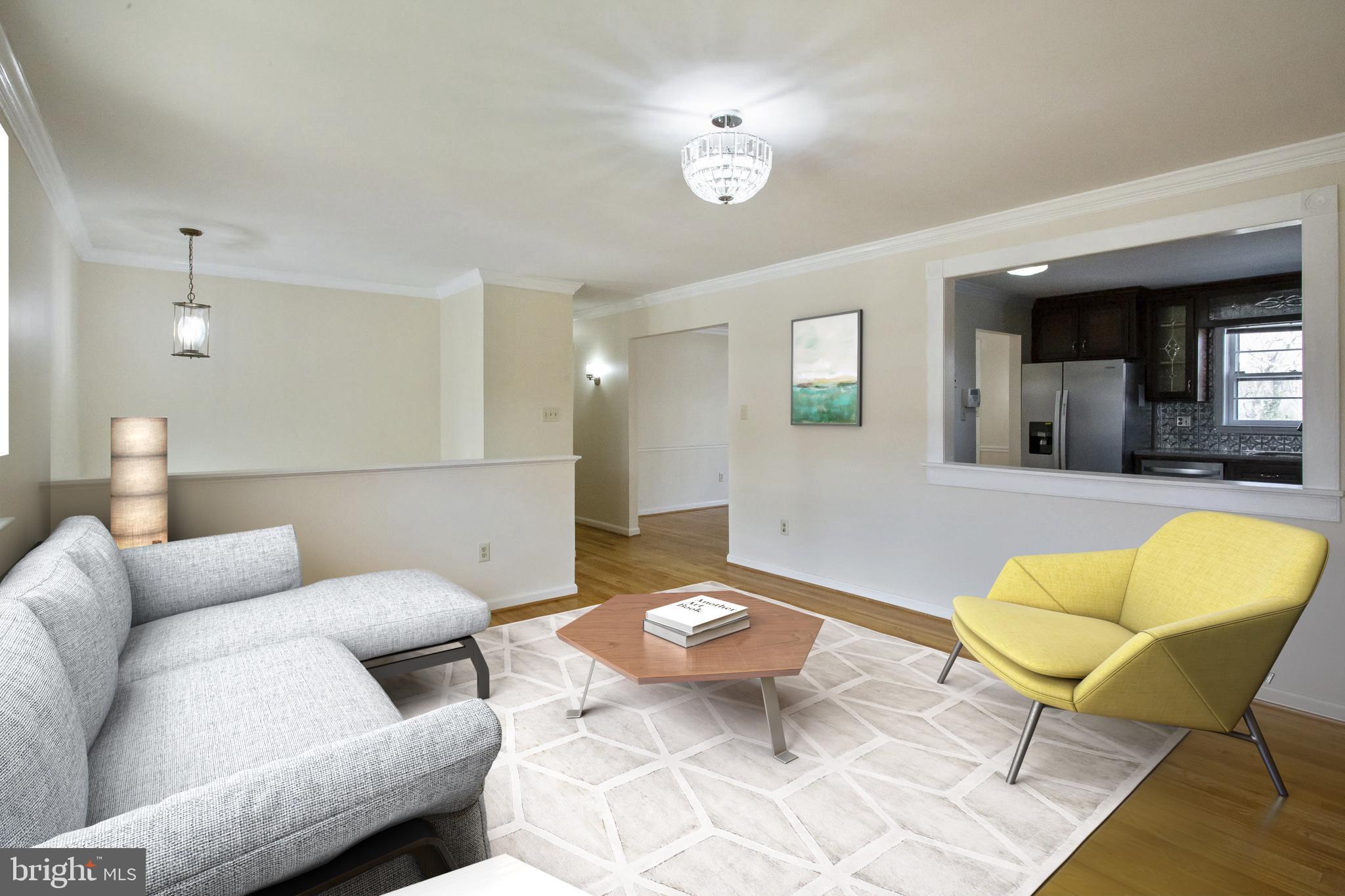 6804 Robinia Road Temple Hills, MD 20748 - Photo 4 of 26 Spacious Living Room with pass through to kitchen