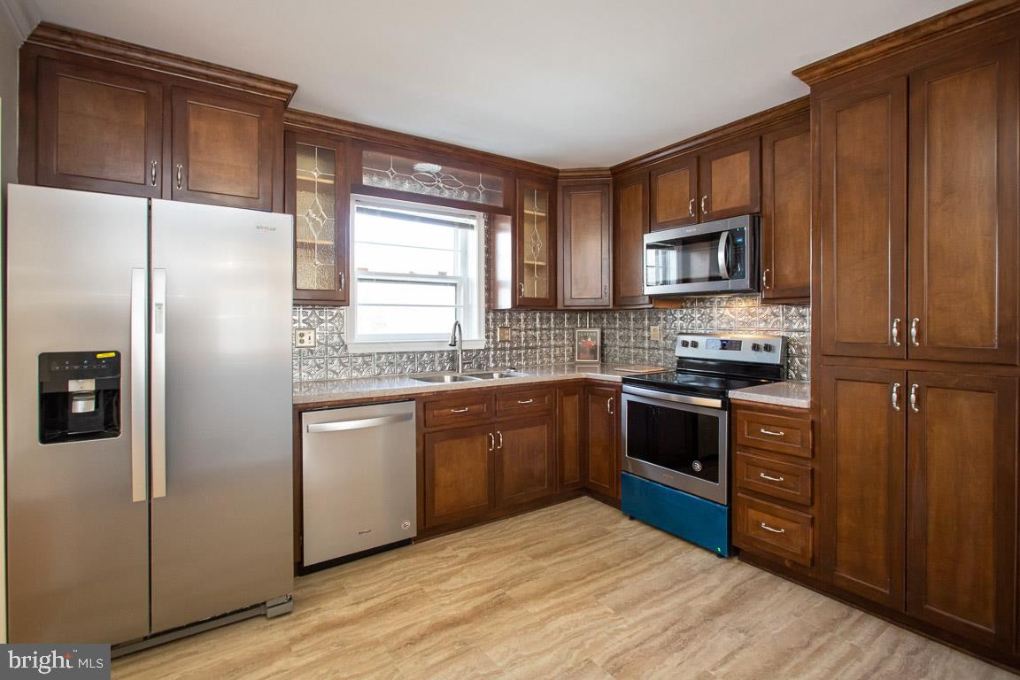 6804 Robinia Road Temple Hills, MD 20748 - Photo 5 of 26 Renovated Kitchen
