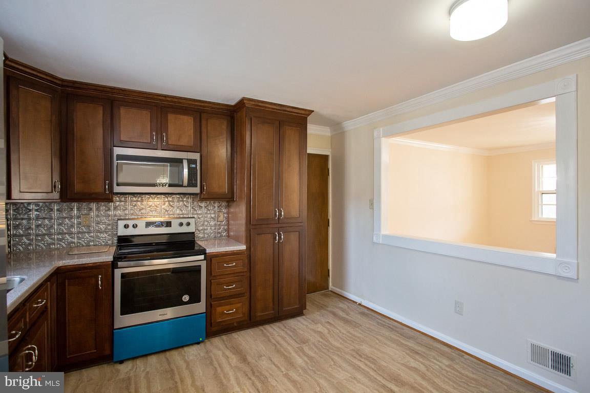 6804 Robinia Road Temple Hills, MD 20748 - Photo 7 of 26 Renovated Kitchen