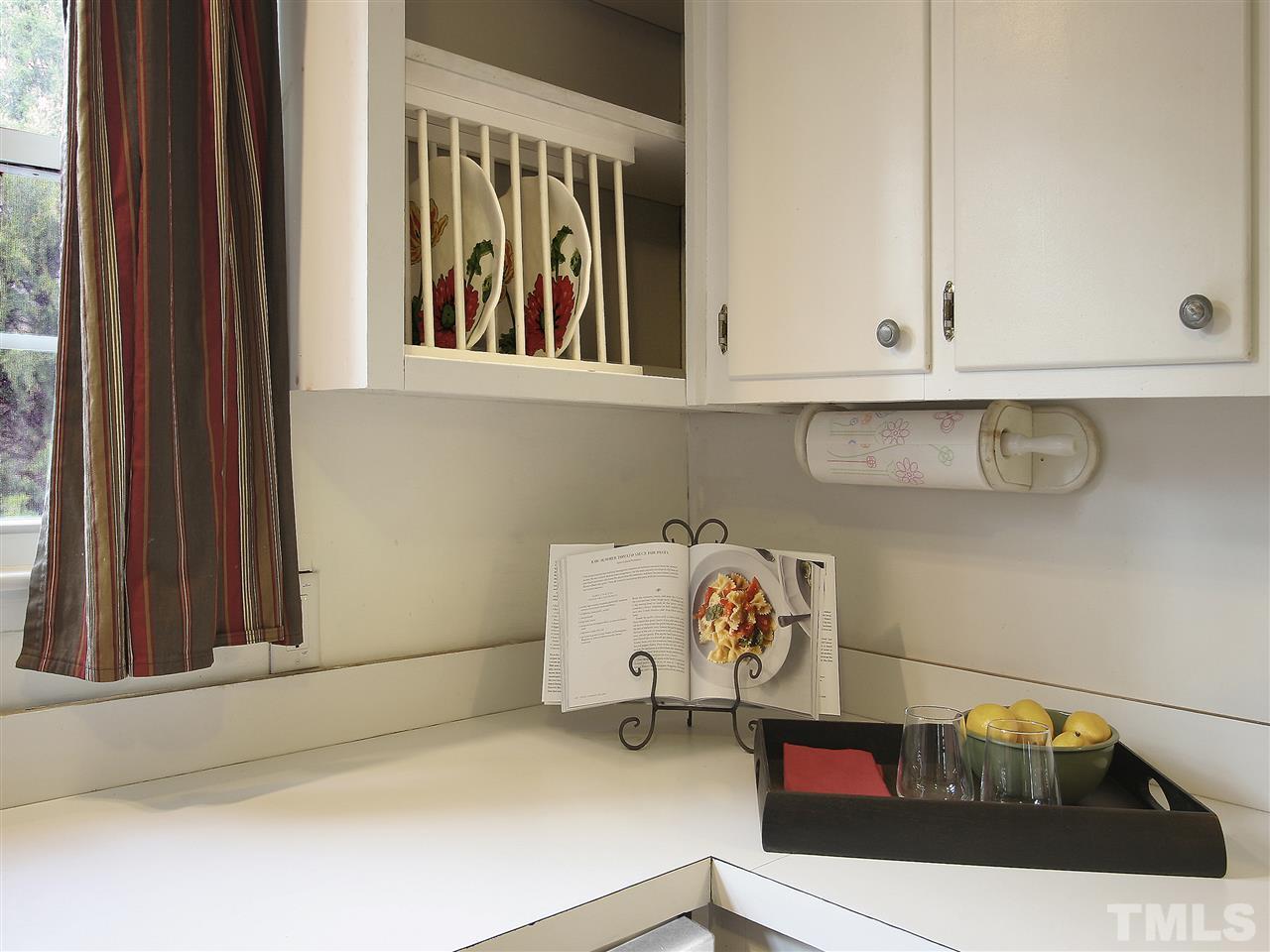12700 School House Road Middlesex, NC 27557 - Photo 8 of 25 Lots of lovely details including this open cabinet with convenient built-in plate rack.
