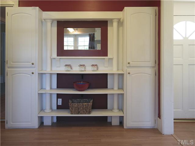 12700 School House Road Middlesex, NC 27557 - Photo 9 of 25 Lots of storage. These pantry-style cabinets flank open shelving--great for canned goods, small kitchen appliances and your more decorative cooking items.