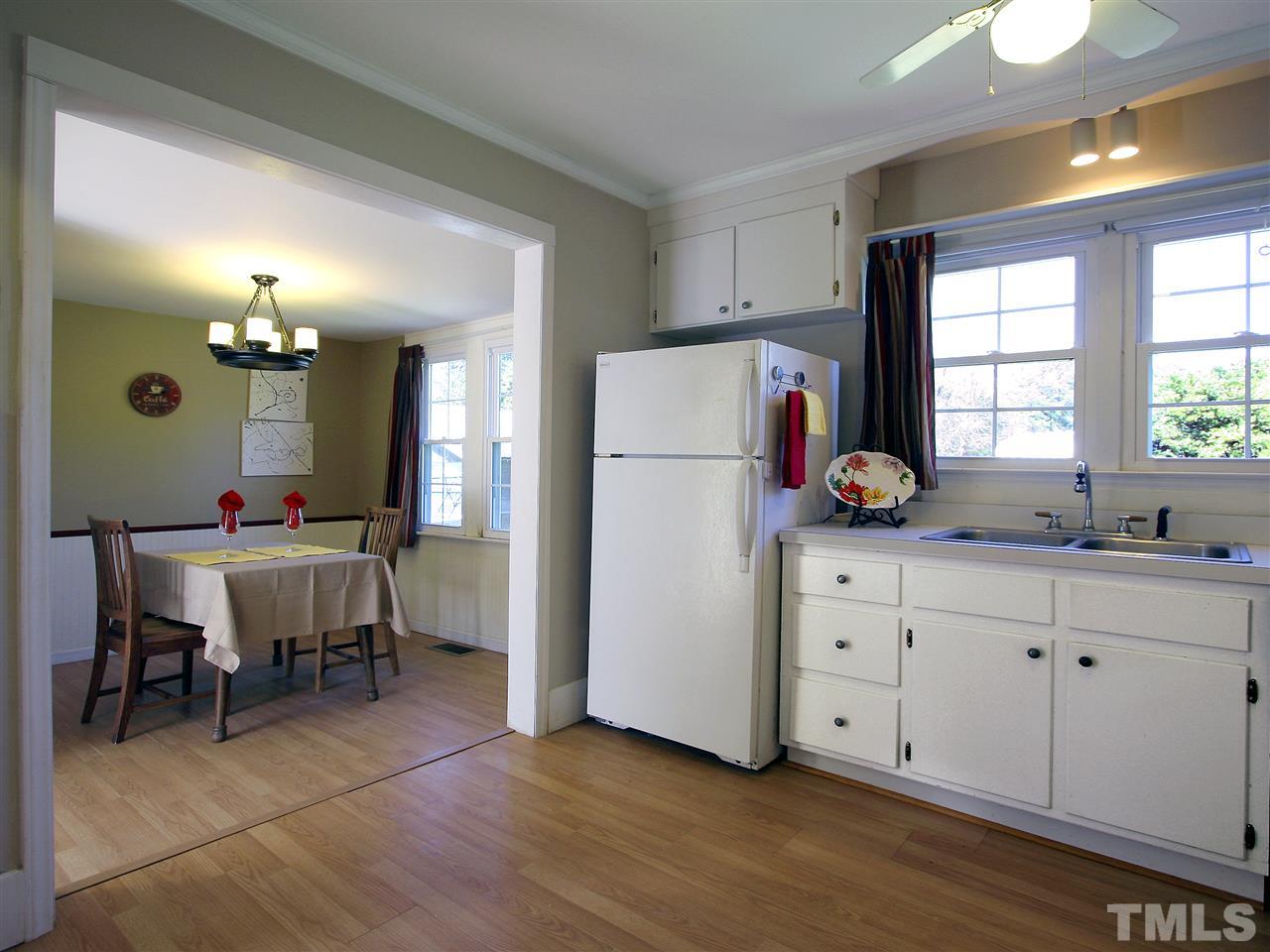 12700 School House Road Middlesex, NC 27557 - Photo 10 of 25 View from kitchen to dining room. Kitchen has lots of floor space with room for an additional dining table or butcher-block island.