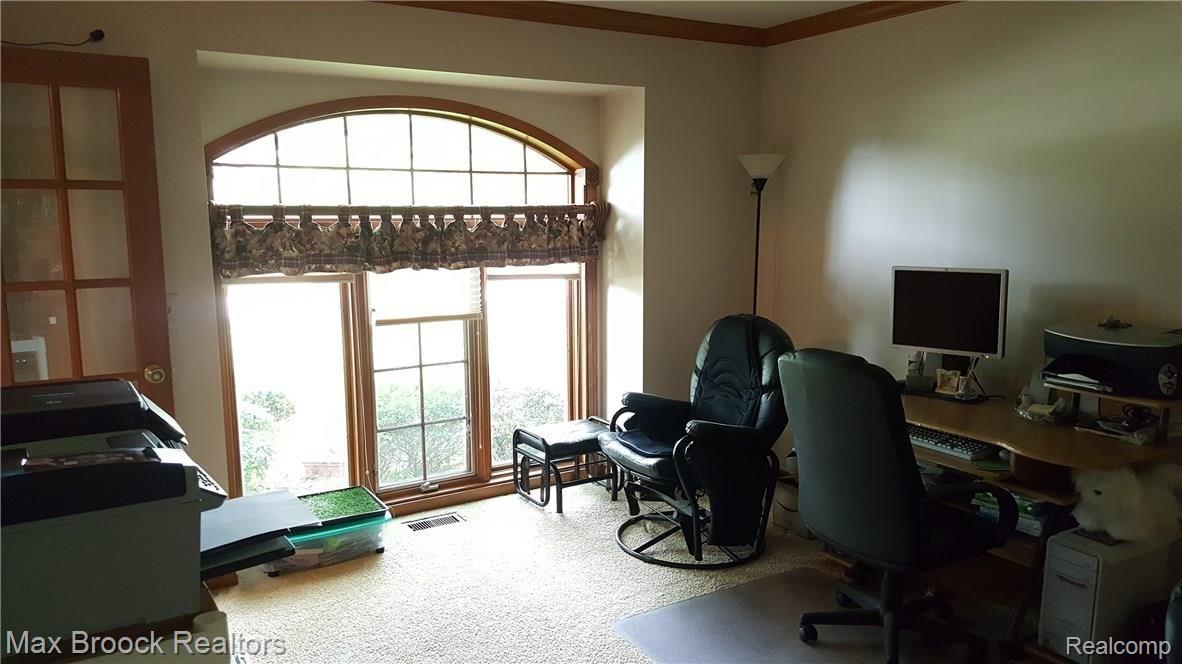 4792 Seasons Drive Troy, MI 48098 - Photo 10 of 18 Bright large floor to ceiling window in Library