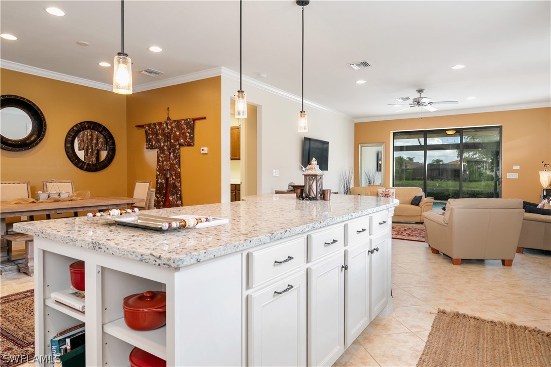 10922 Dennington Road Fort Myers, FL 33913 - Photo 14 of 35 a bathroom with a granite countertop sink and a large mirror