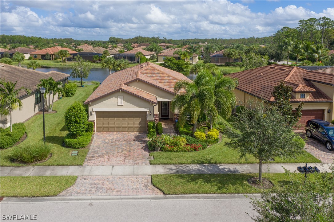 10922 Dennington Road Fort Myers, FL 33913 - Photo 29 of 35 a view of house and garden