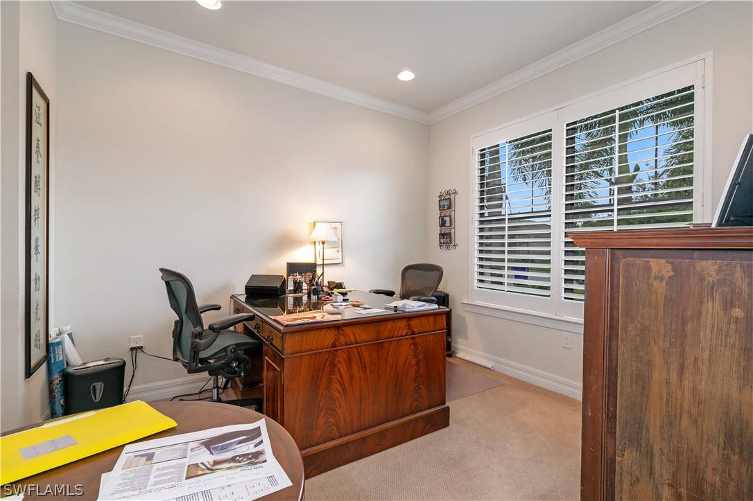10922 Dennington Road Fort Myers, FL 33913 - Photo 8 of 35 a view of a workspace with furniture and a window