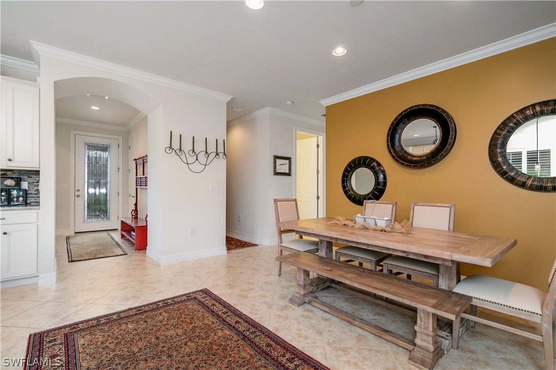 10922 Dennington Road Fort Myers, FL 33913 - Photo 10 of 35 a living room with furniture and a table