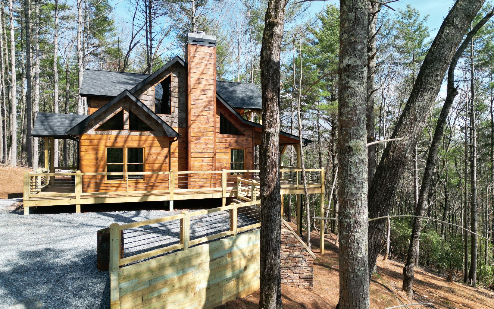 a front view of a house with parking area