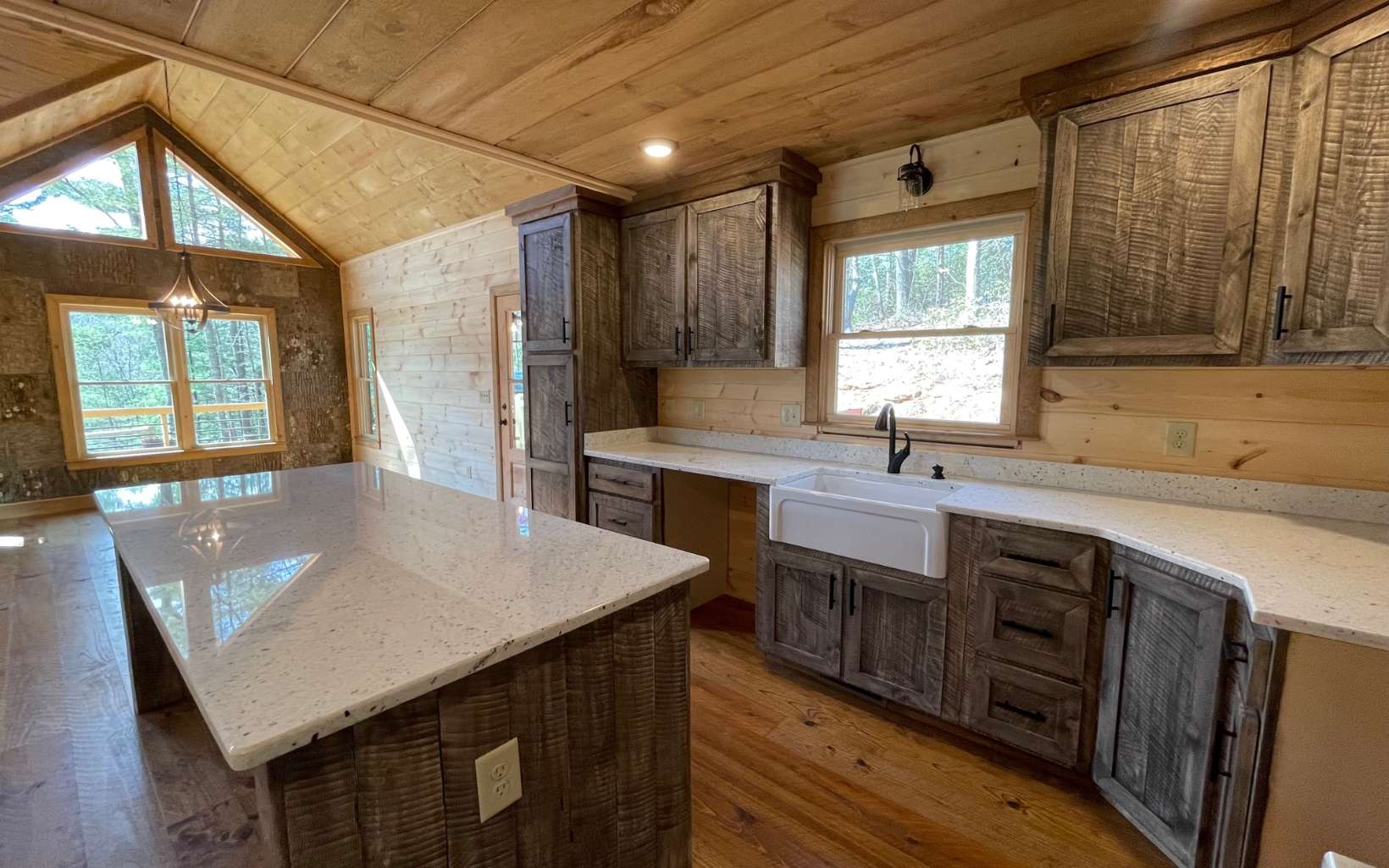58 Papa Bear Path Cherry Log, GA 30522 - Photo 13 of 33 a kitchen with a sink window and cabinets