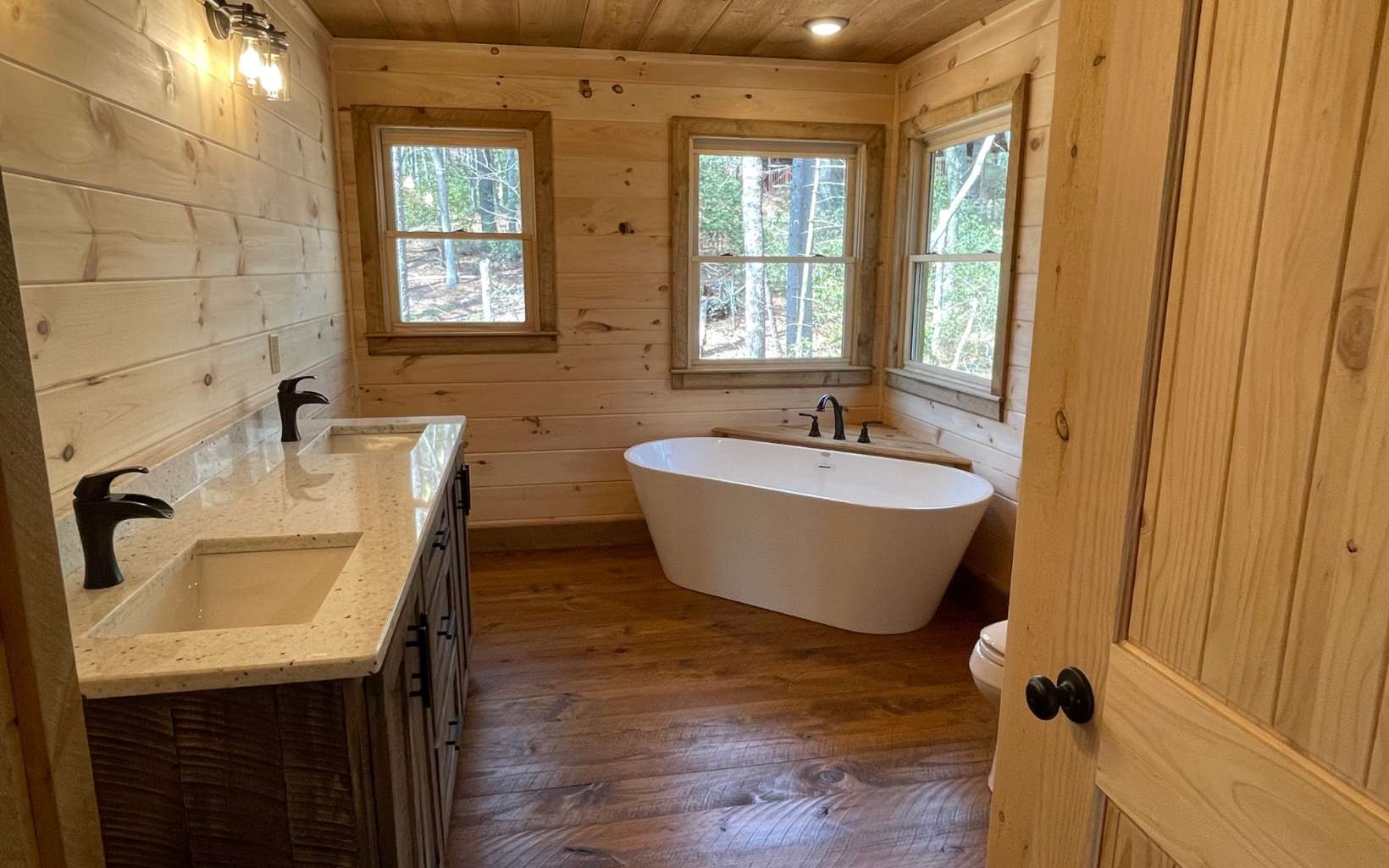 58 Papa Bear Path Cherry Log, GA 30522 - Photo 17 of 33 a view of a bathroom with a sink and a bathtub