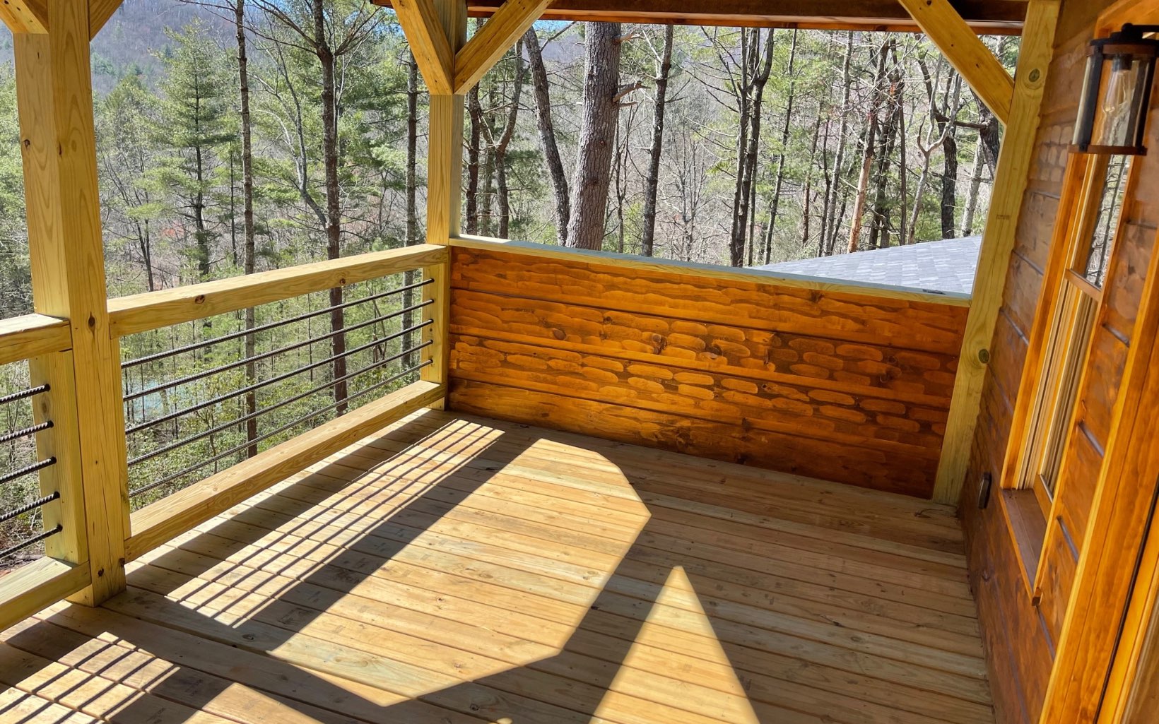58 Papa Bear Path Cherry Log, GA 30522 - Photo 21 of 33 a view of a balcony with wooden floor