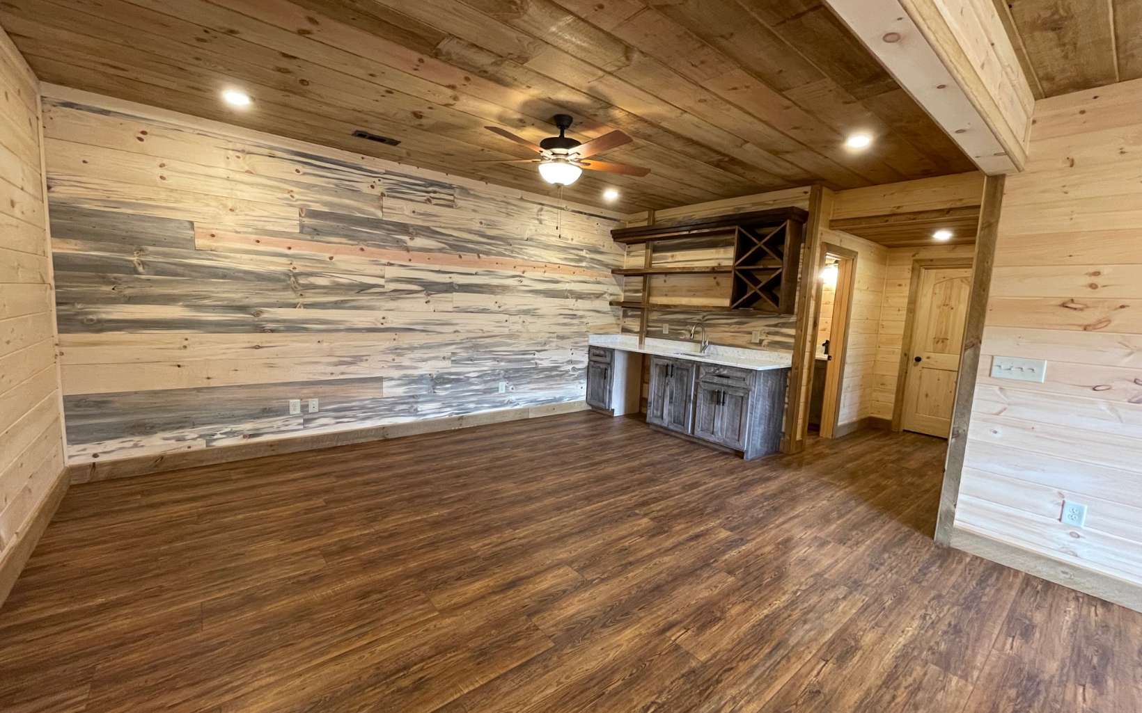 58 Papa Bear Path Cherry Log, GA 30522 - Photo 27 of 33 a room with wooden floors and kitchen view