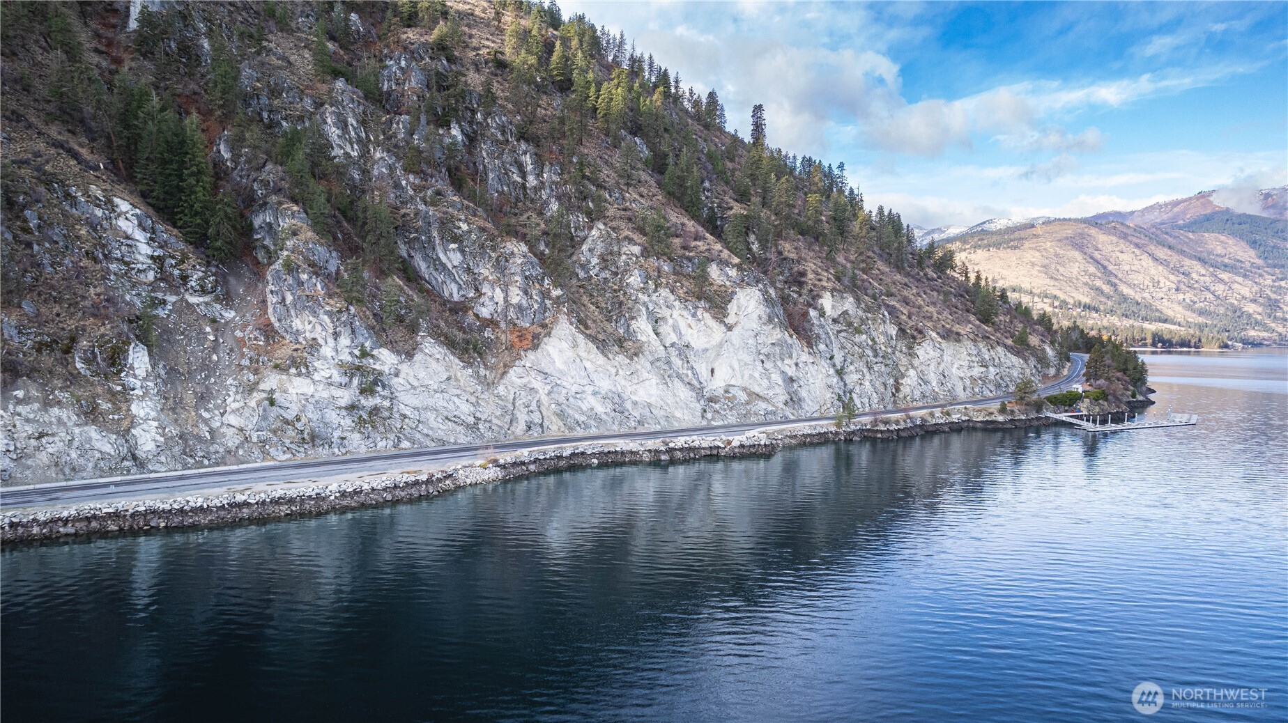 -nna South Lakeshore Road Chelan, WA 98816 - Photo 3 of 7 a view of a lake with trees in the background