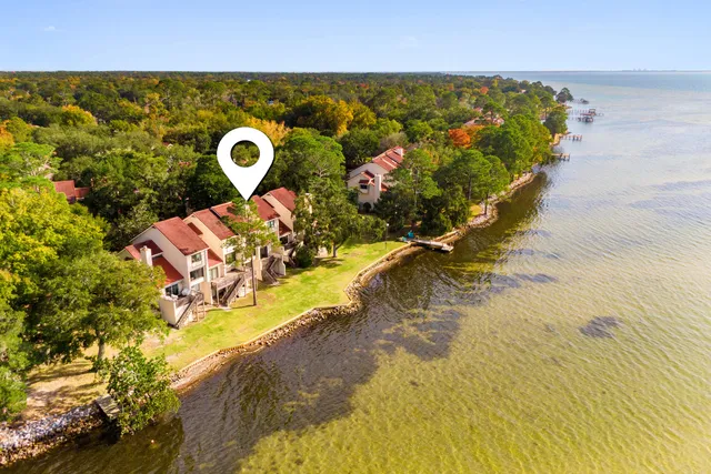 a view of a balcony with ocean view