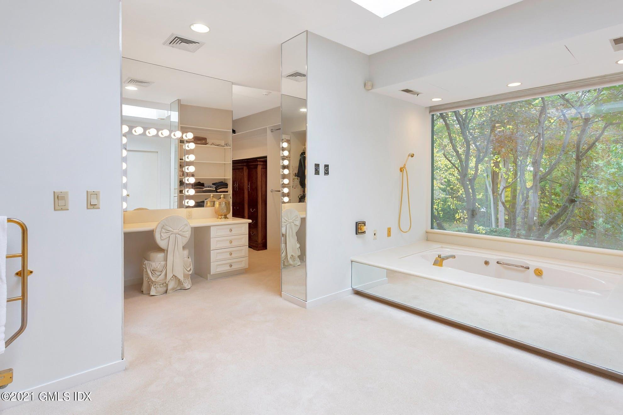 7 Chateau Ridge Road Greenwich, CT 06831 - Photo 13 of 36 a large white room with a large window and walk in closet