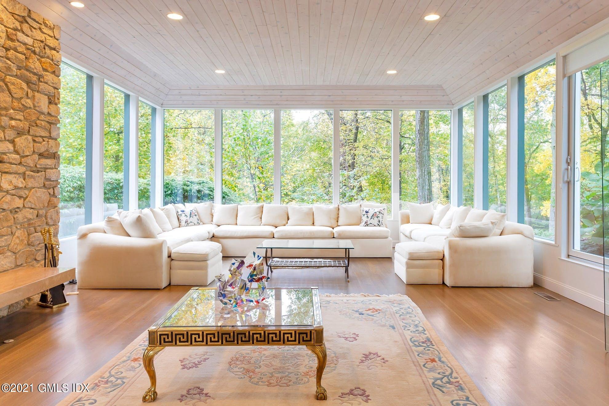 7 Chateau Ridge Road Greenwich, CT 06831 - Photo 4 of 36 a living room with furniture and a large window