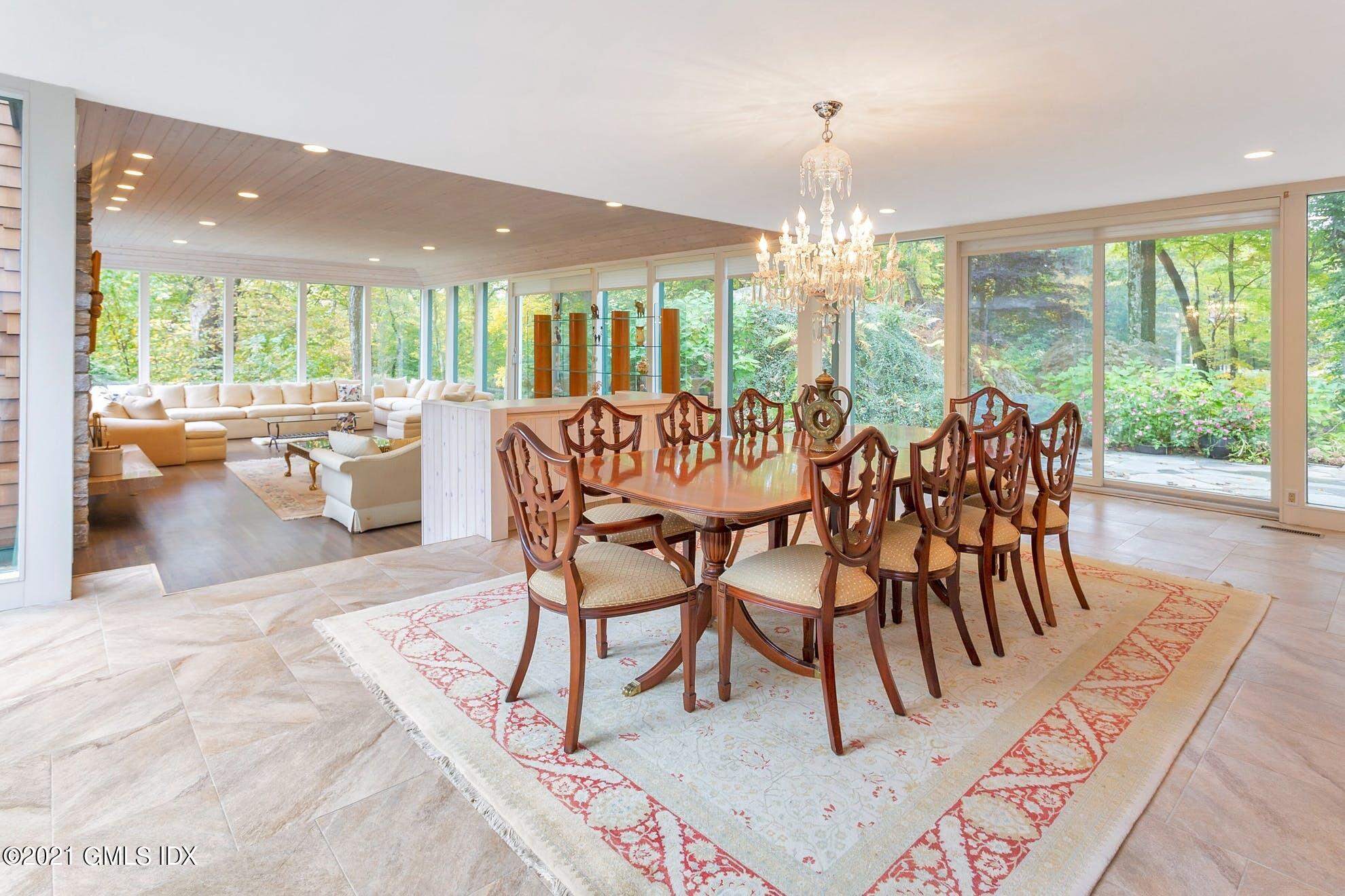 7 Chateau Ridge Road Greenwich, CT 06831 - Photo 6 of 36 a view of a dining room with furniture window and outside view