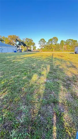 a view of an ocean and mountains