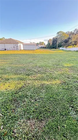 a view of an ocean and a mountain