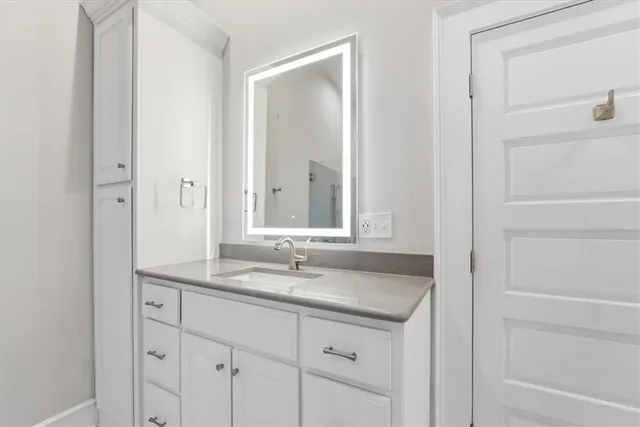 a white bath tub sitting in a bathroom