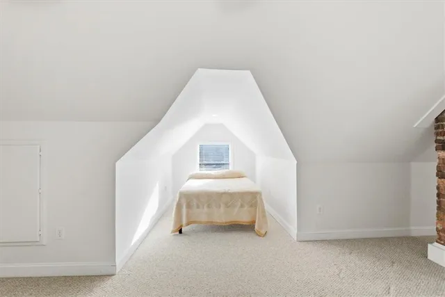 a swimming pool with outdoor seating and yard