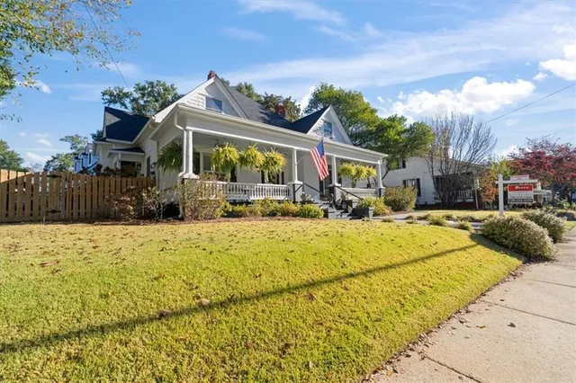 a view of a swimming pool with a patio