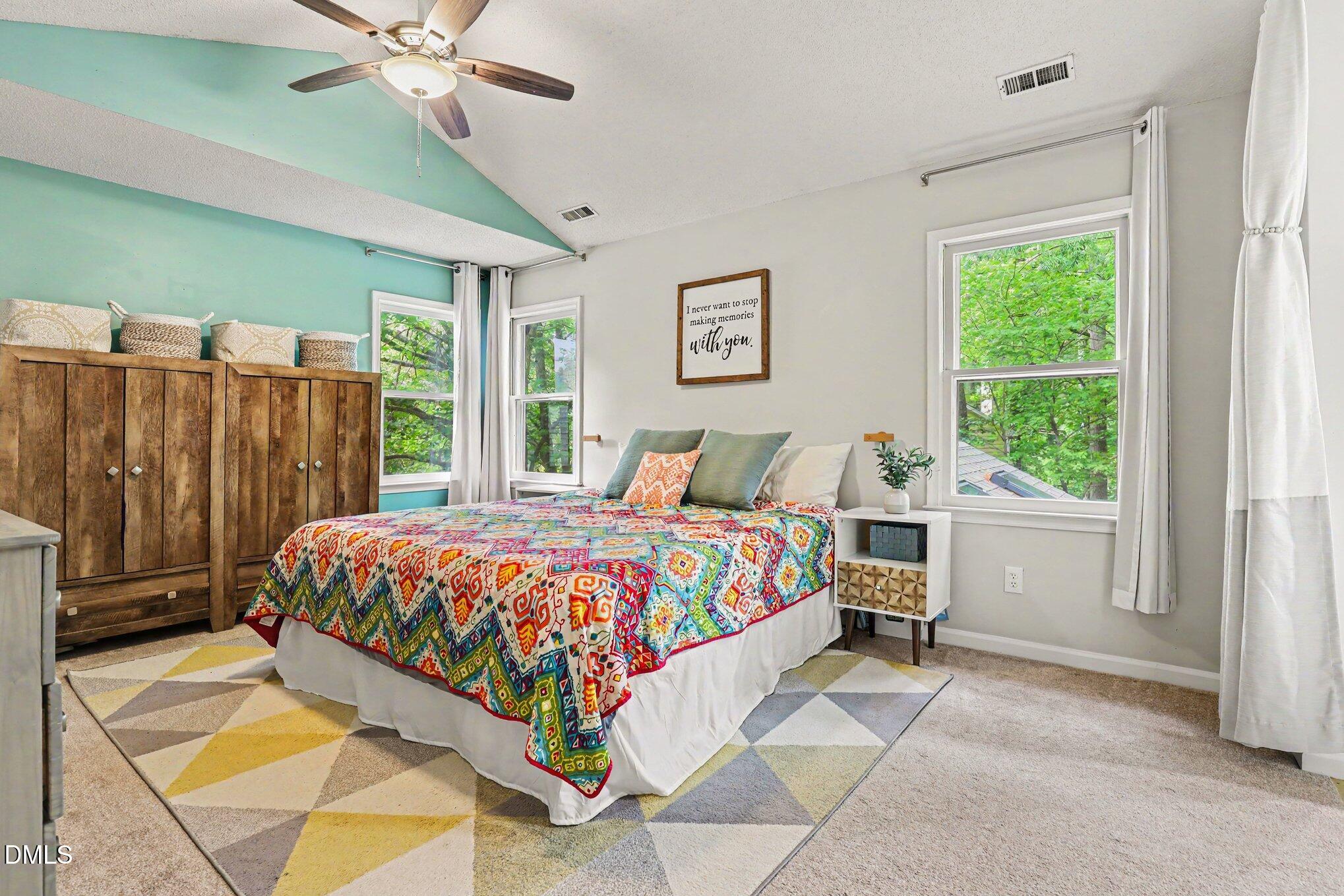 5468 Ingate Way Raleigh, NC 27613 - Photo 18 of 24 a bedroom with a bed and window