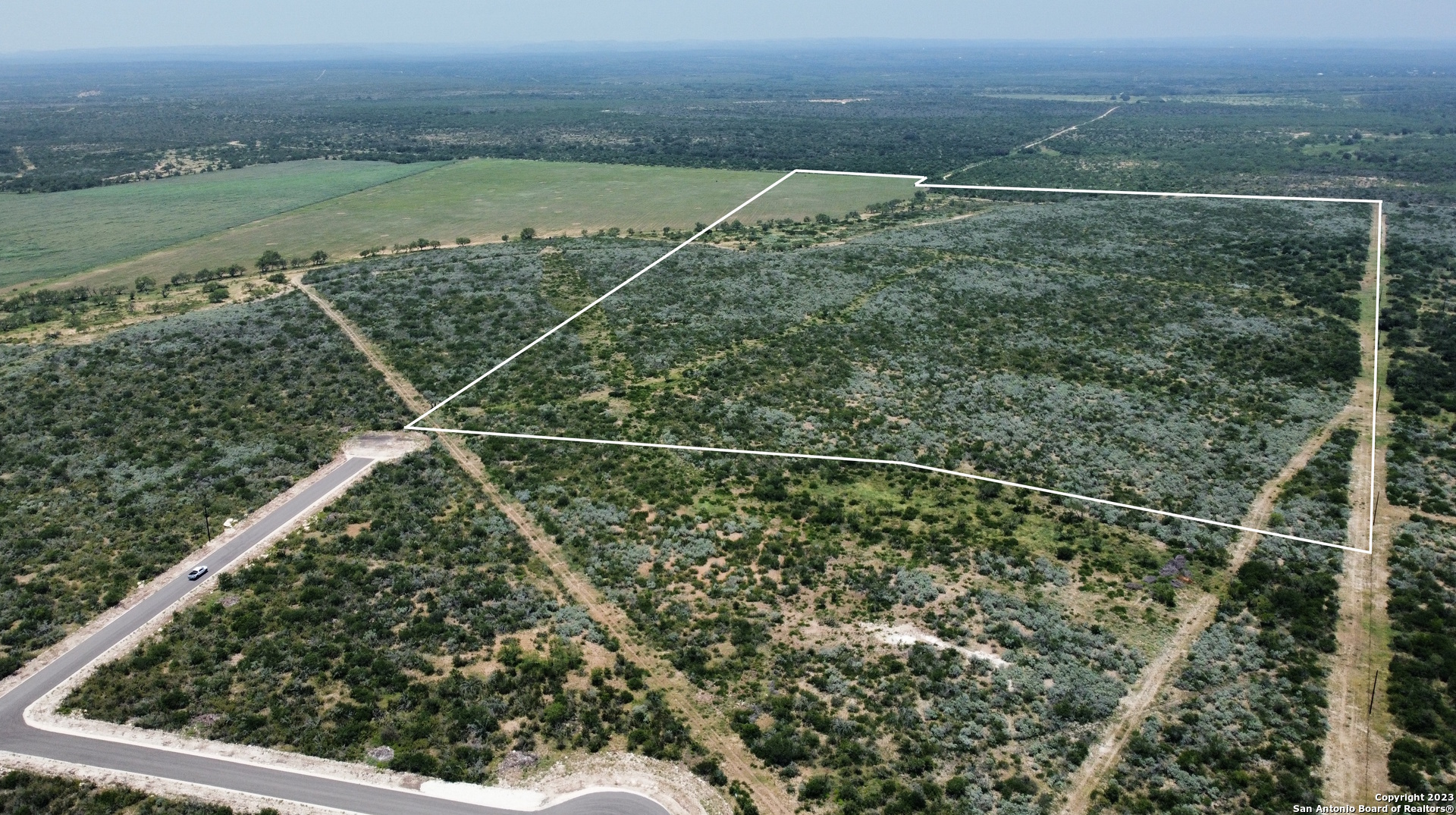660 Legend Hills Uvalde, TX 78801 - Photo 7 of 13 a view of a yard from a balcony