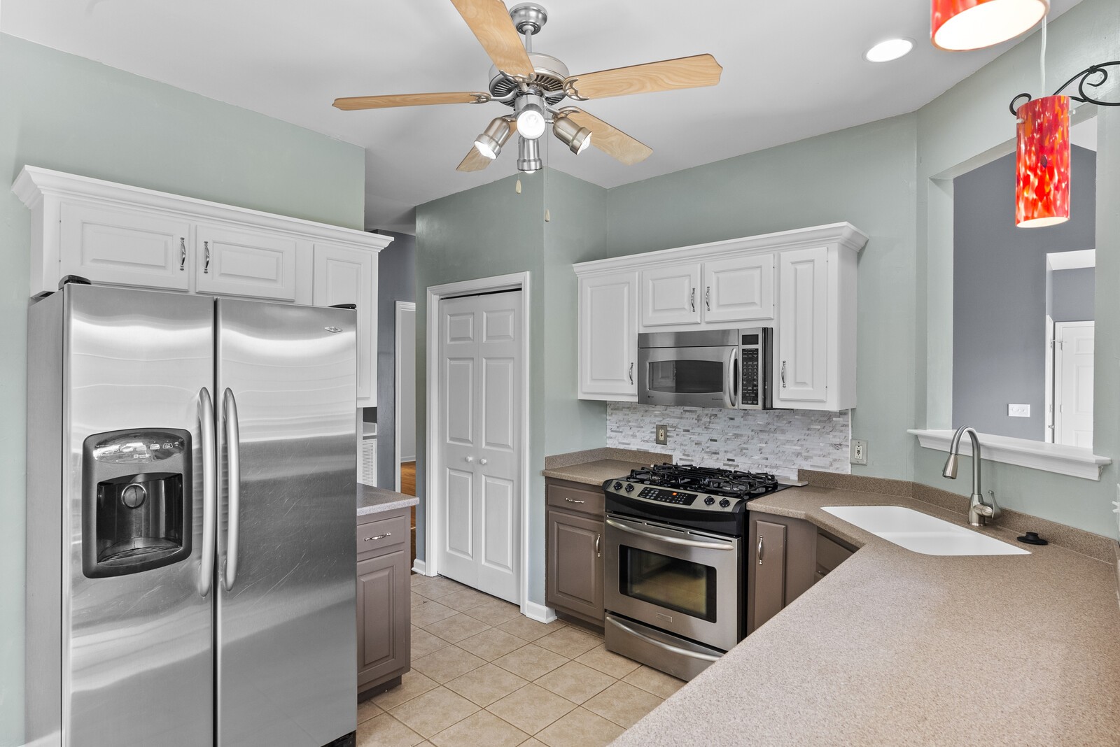 450 Brown Road Lebanon, TN 37087 - Photo 16 of 37 a kitchen with stainless steel appliances granite countertop a refrigerator a stove and a sink