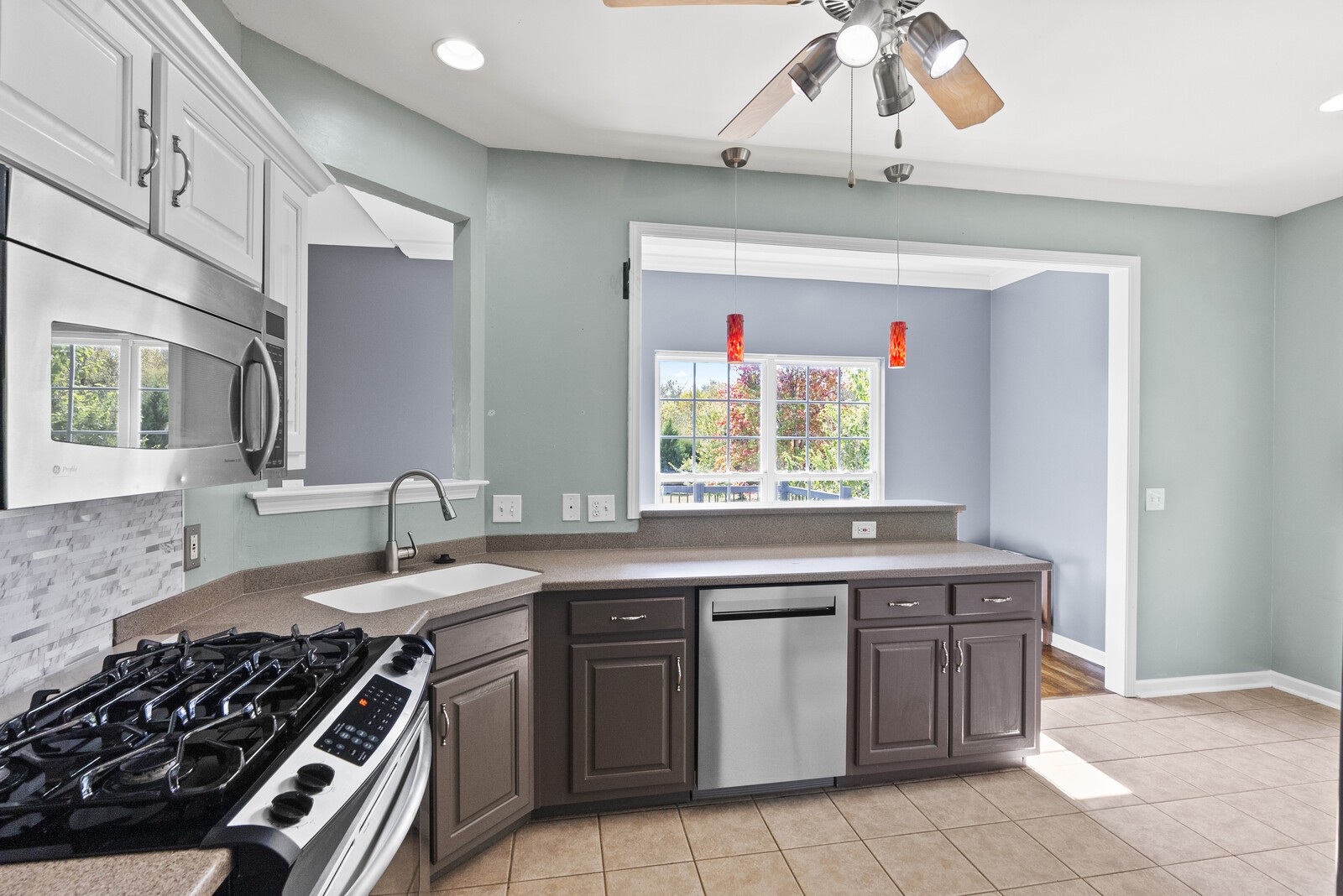 450 Brown Road Lebanon, TN 37087 - Photo 19 of 37 a kitchen with a sink stove and cabinets