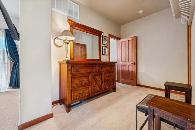 a view of a livingroom with furniture