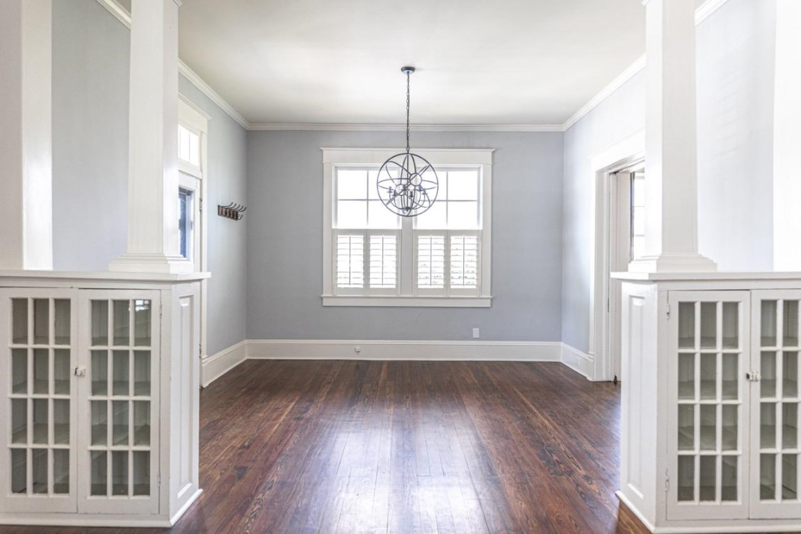 Undisclosed Address Raleigh, NC 27605 - Photo 6 of 29 wooden floor in an empty room with a window