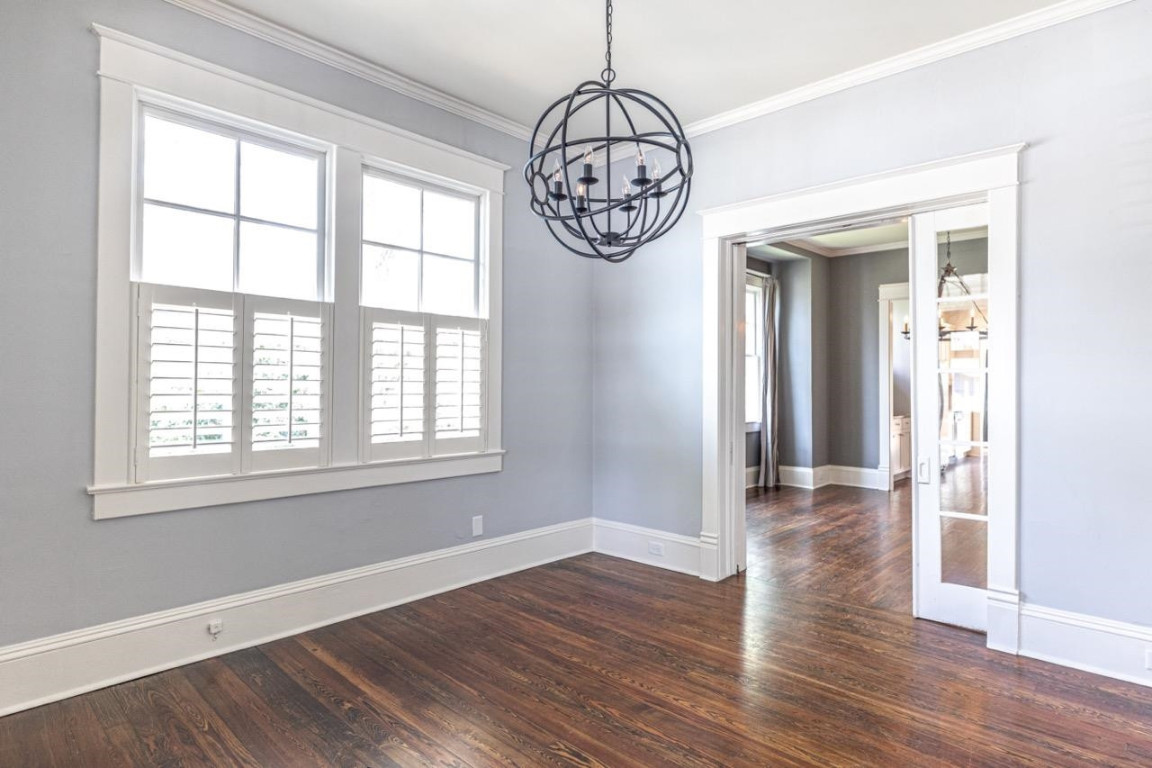 Undisclosed Address Raleigh, NC 27605 - Photo 7 of 29 a view of an entryway with wooden floor