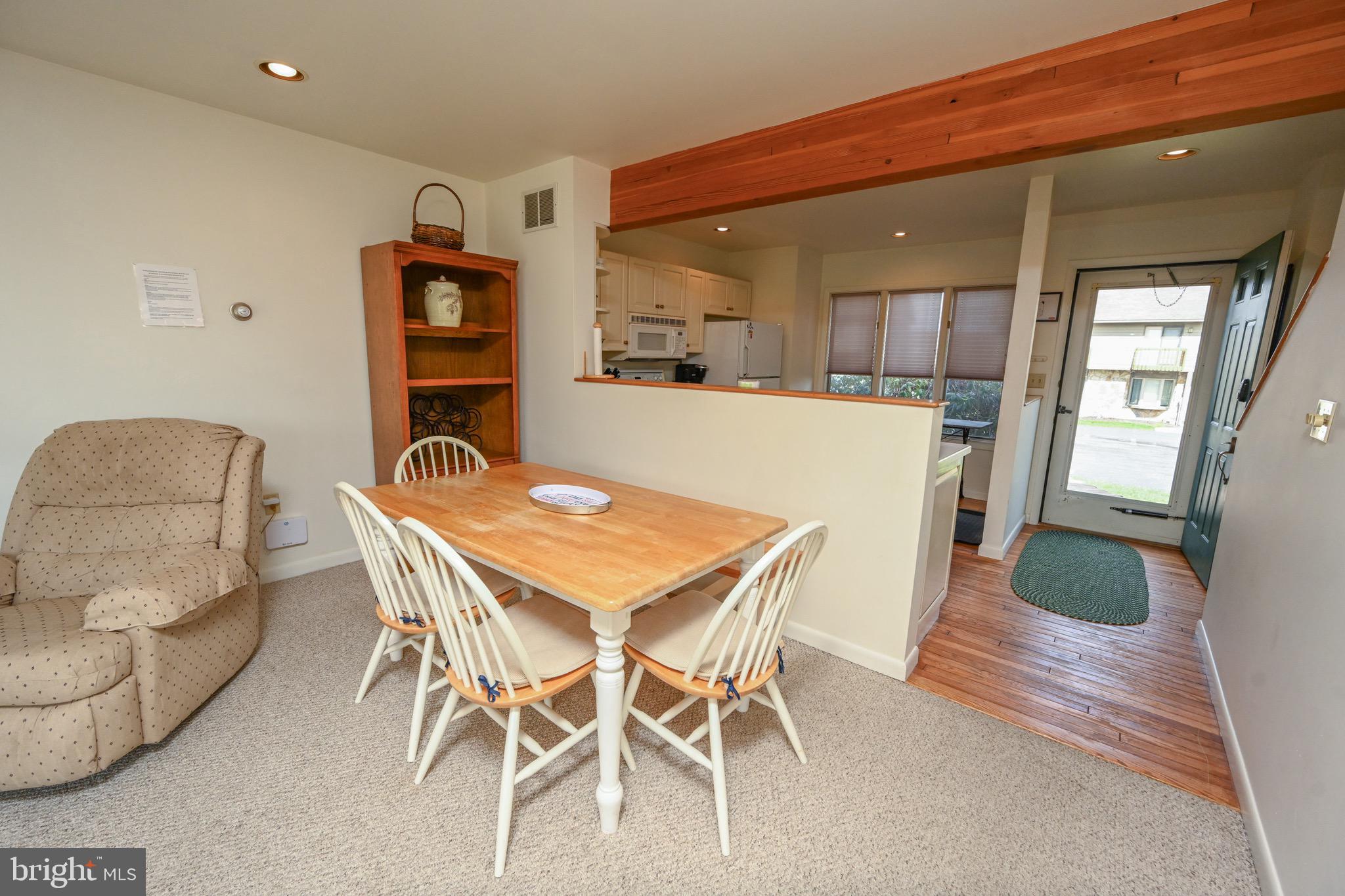 257 Marsh Hill Road, Unit 1 McHenry, MD 21541 - Photo 11 of 50 a dining room with furniture and wooden floor