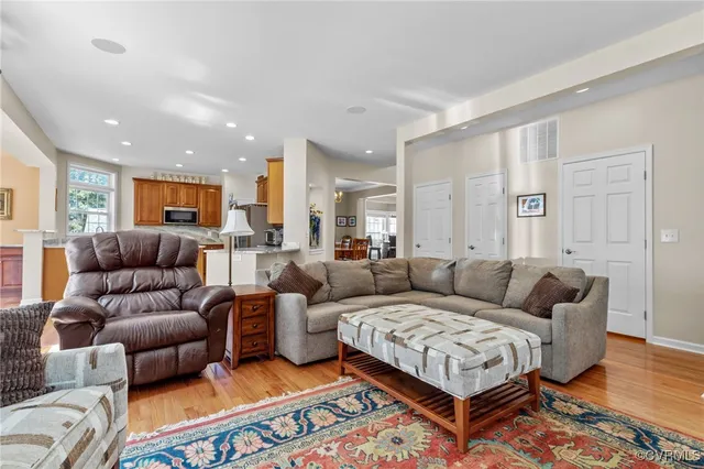 a living room with furniture and a couch