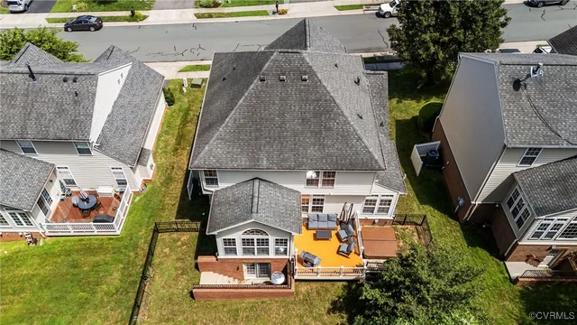 an aerial view of a house with swimming pool