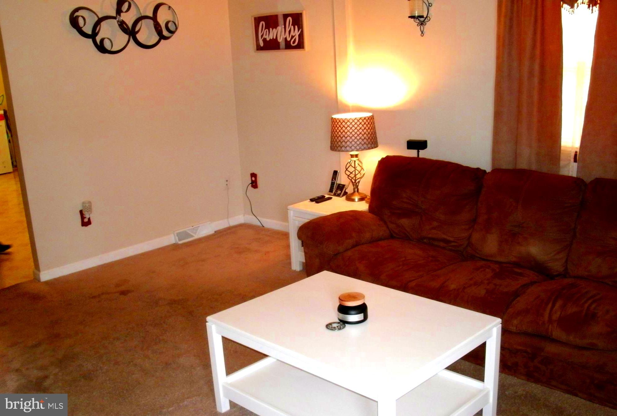 546 Compass Road East Middle River, MD 21220 - Photo 3 of 24 a living room with furniture and a window
